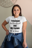 SURVIVING MOTHERHOOD ONE MELTDOWN AT A TIME - LADYFIT T-SHIRT